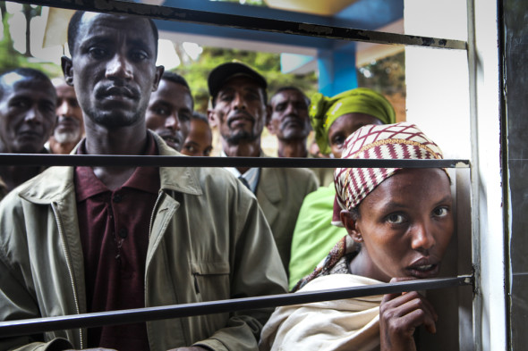 Woman waiting for health care in Gimbie, Ethiopia